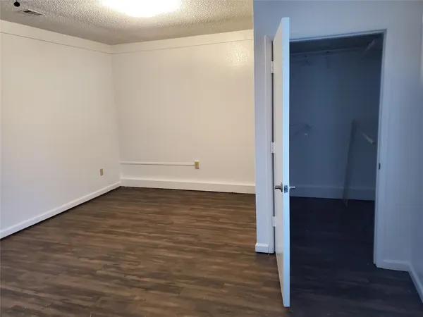 a view of a livingroom and a bathroom