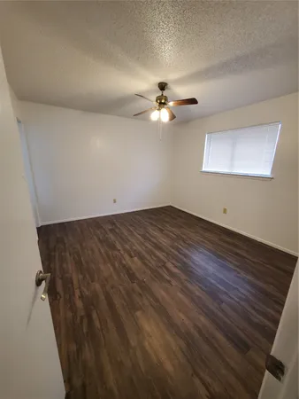 a bathroom with a sink a toilet and vanity
