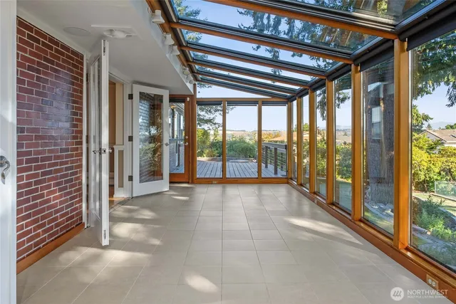a view of an empty room with a balcony