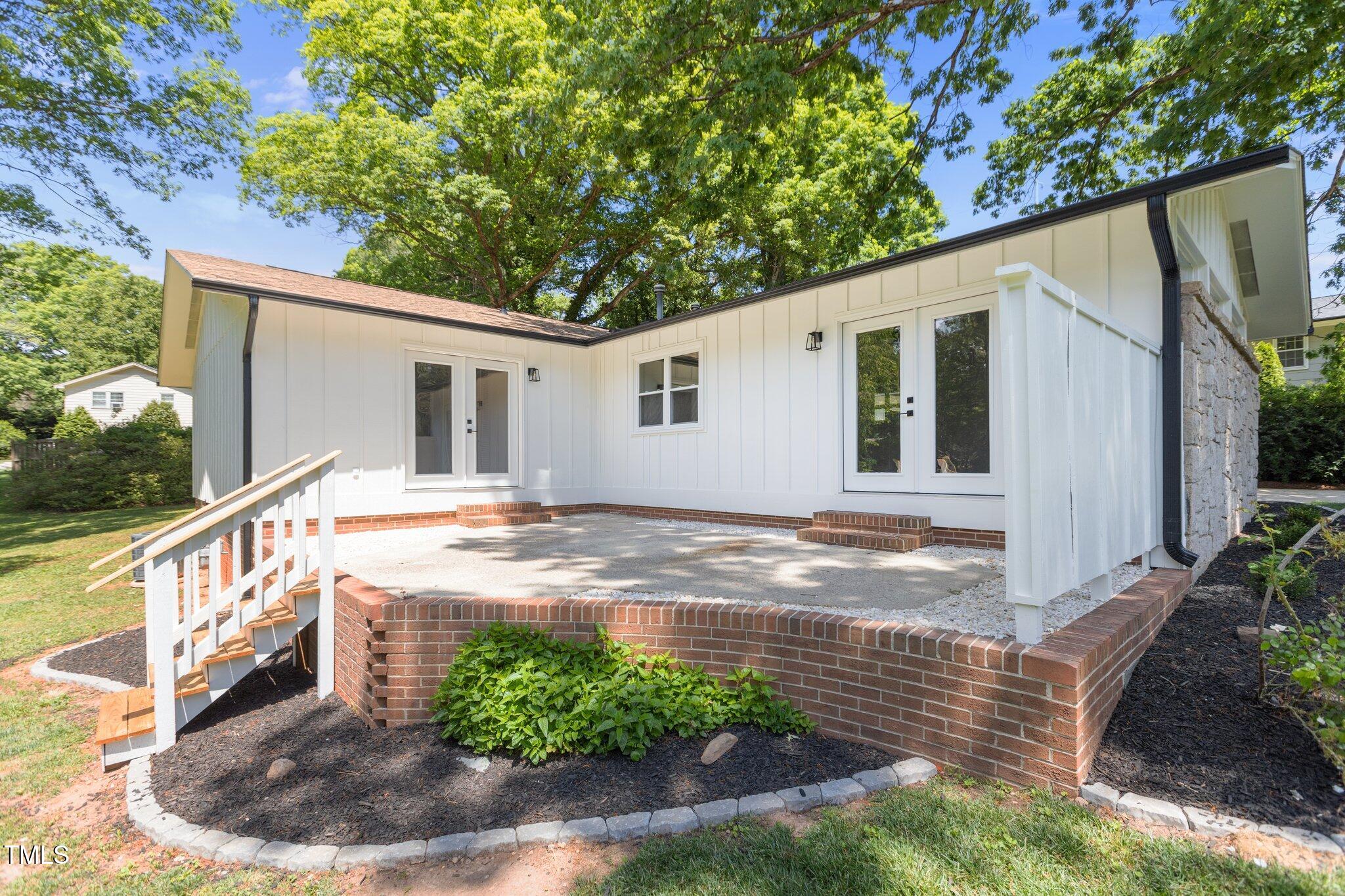 2505 Catalina Court Raleigh, NC 27607 - Photo 20 of 25 a view of a backyard with wooden fence