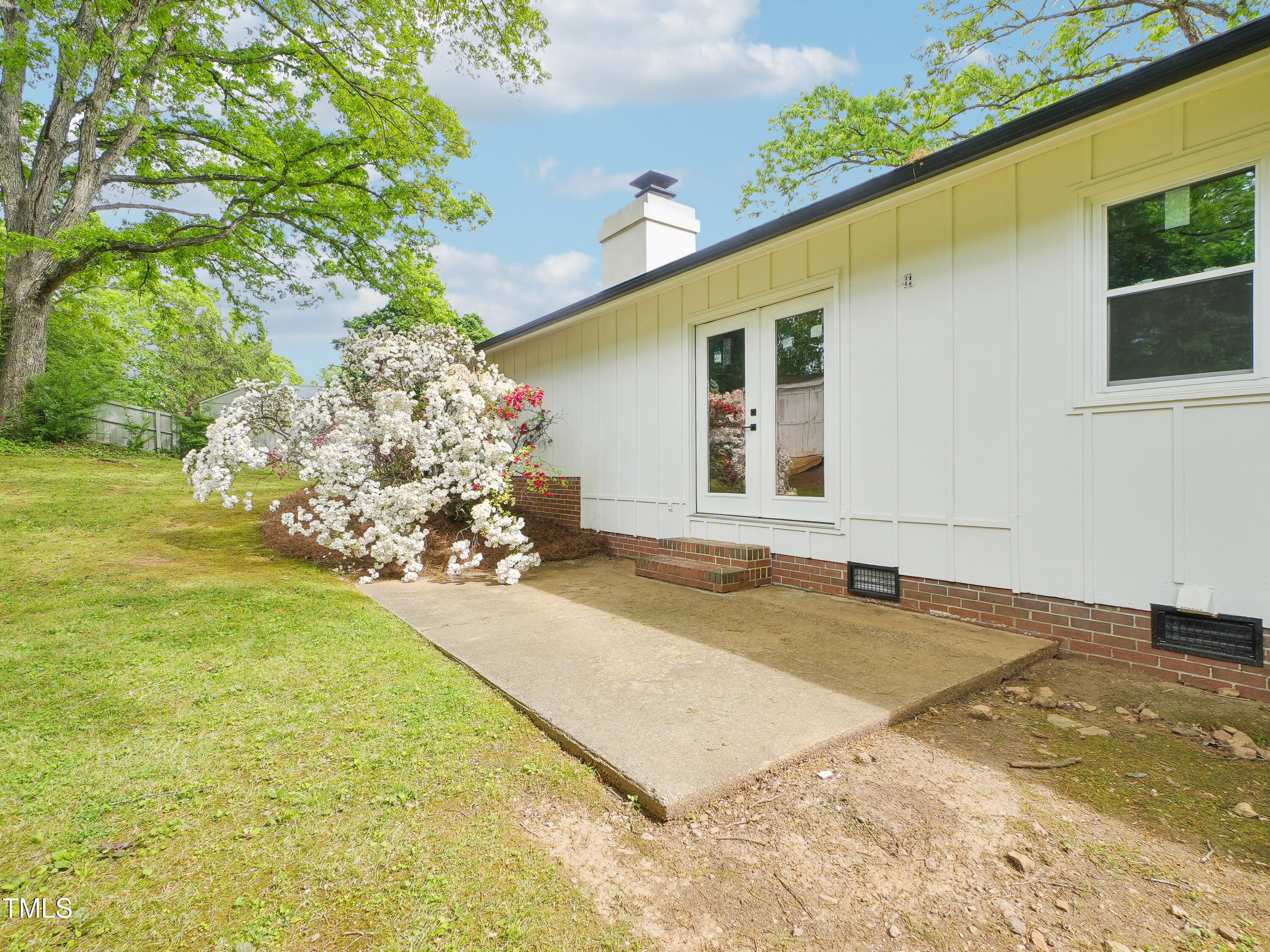 2505 Catalina Court Raleigh, NC 27607 - Photo 23 of 25 a view of a house with a yard and garage