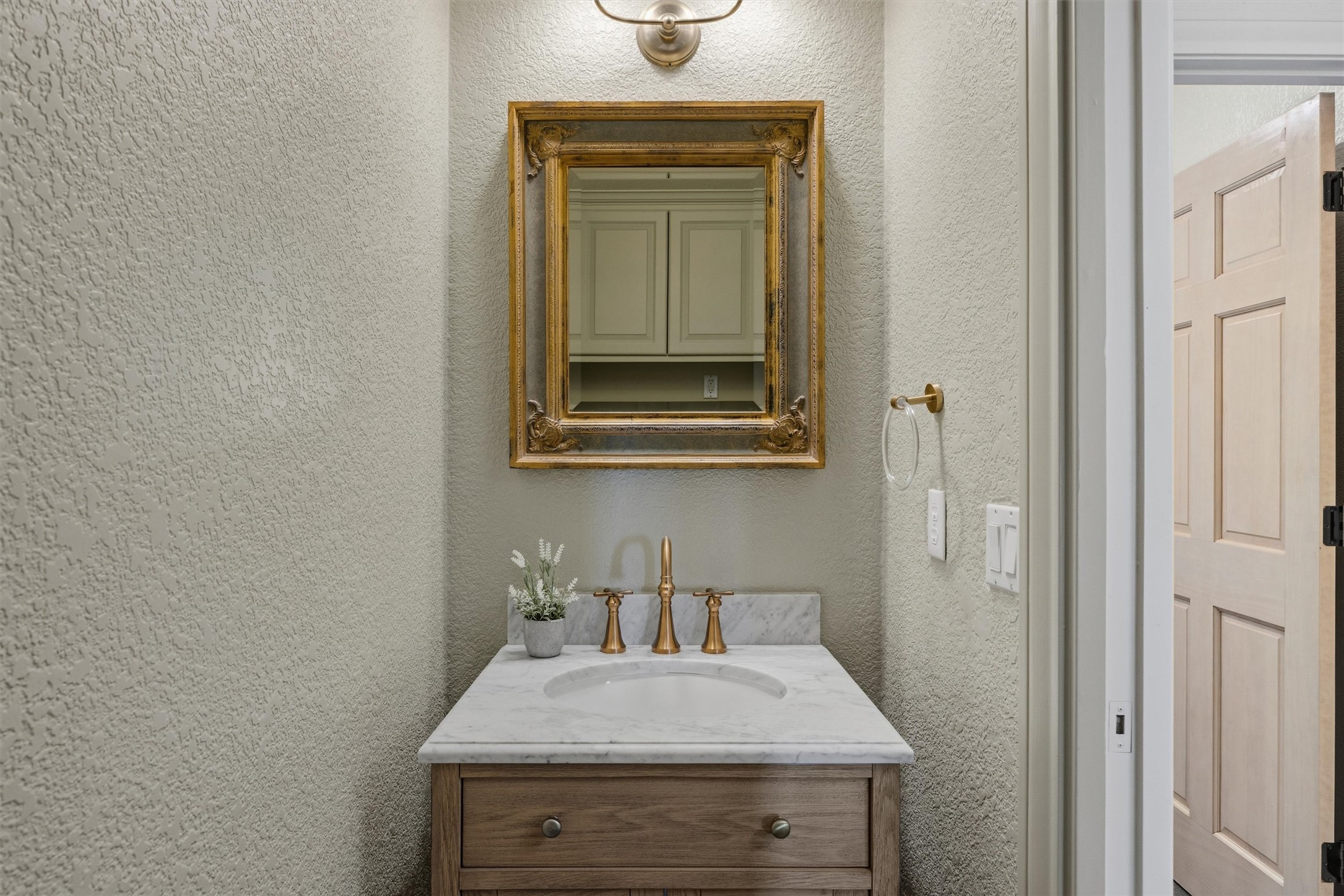 700 Shadow Hill Road Horseshoe Bay, TX 78657 - Photo 13 of 23 a bathroom with a sink and a mirror