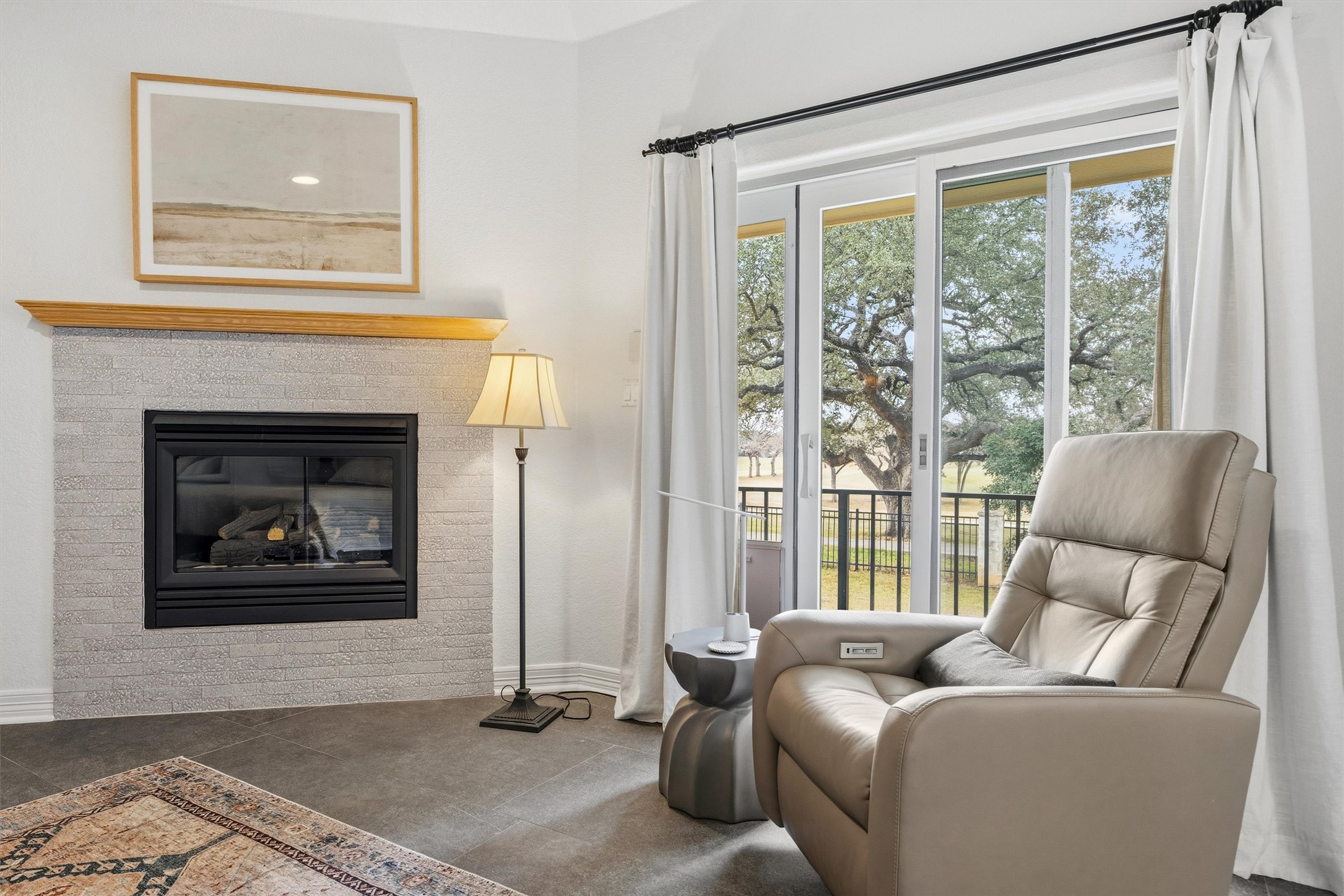 700 Shadow Hill Road Horseshoe Bay, TX 78657 - Photo 15 of 23 a living room with furniture and a floor to ceiling window
