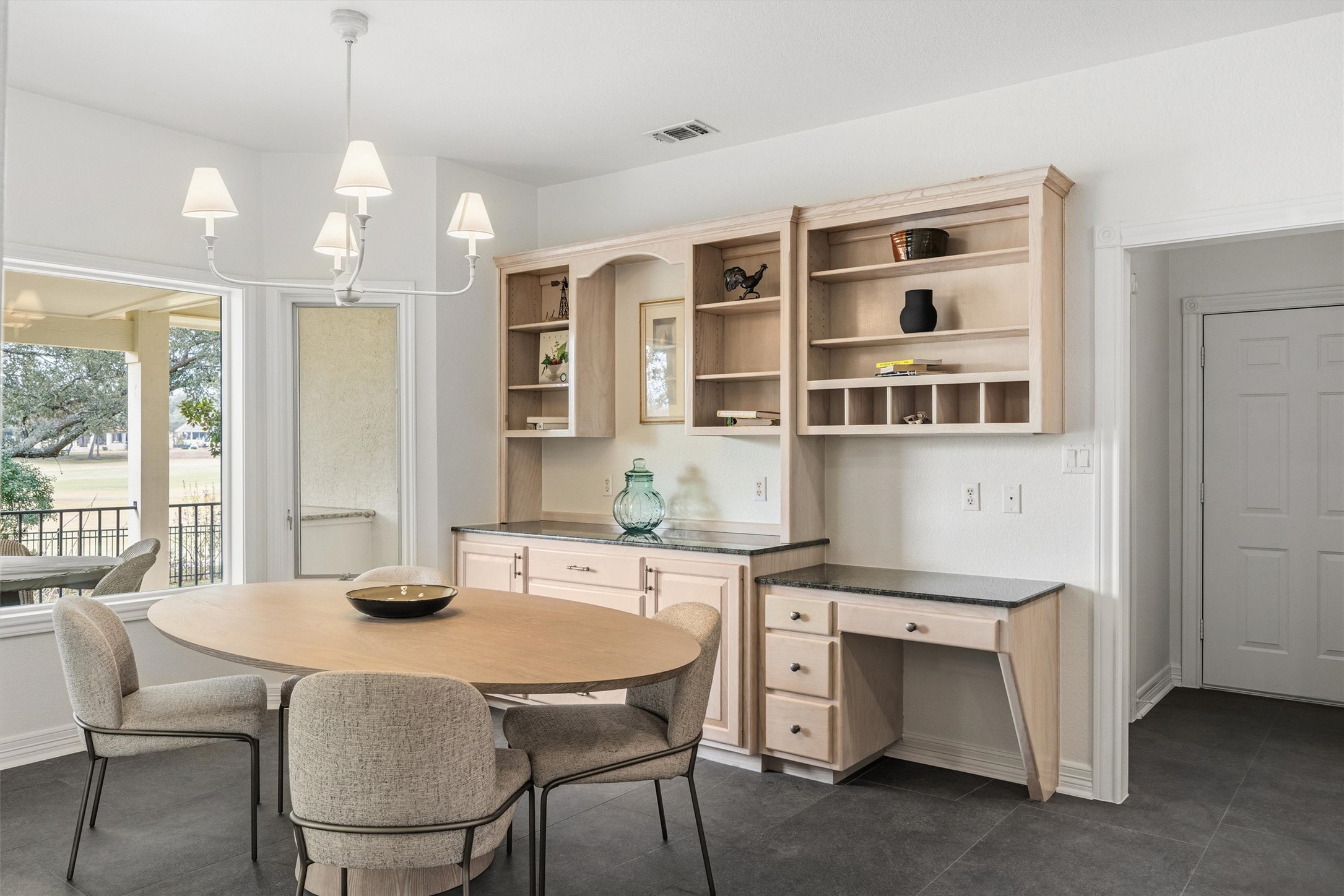 700 Shadow Hill Road Horseshoe Bay, TX 78657 - Photo 19 of 23 a view of a dining room with furniture and window