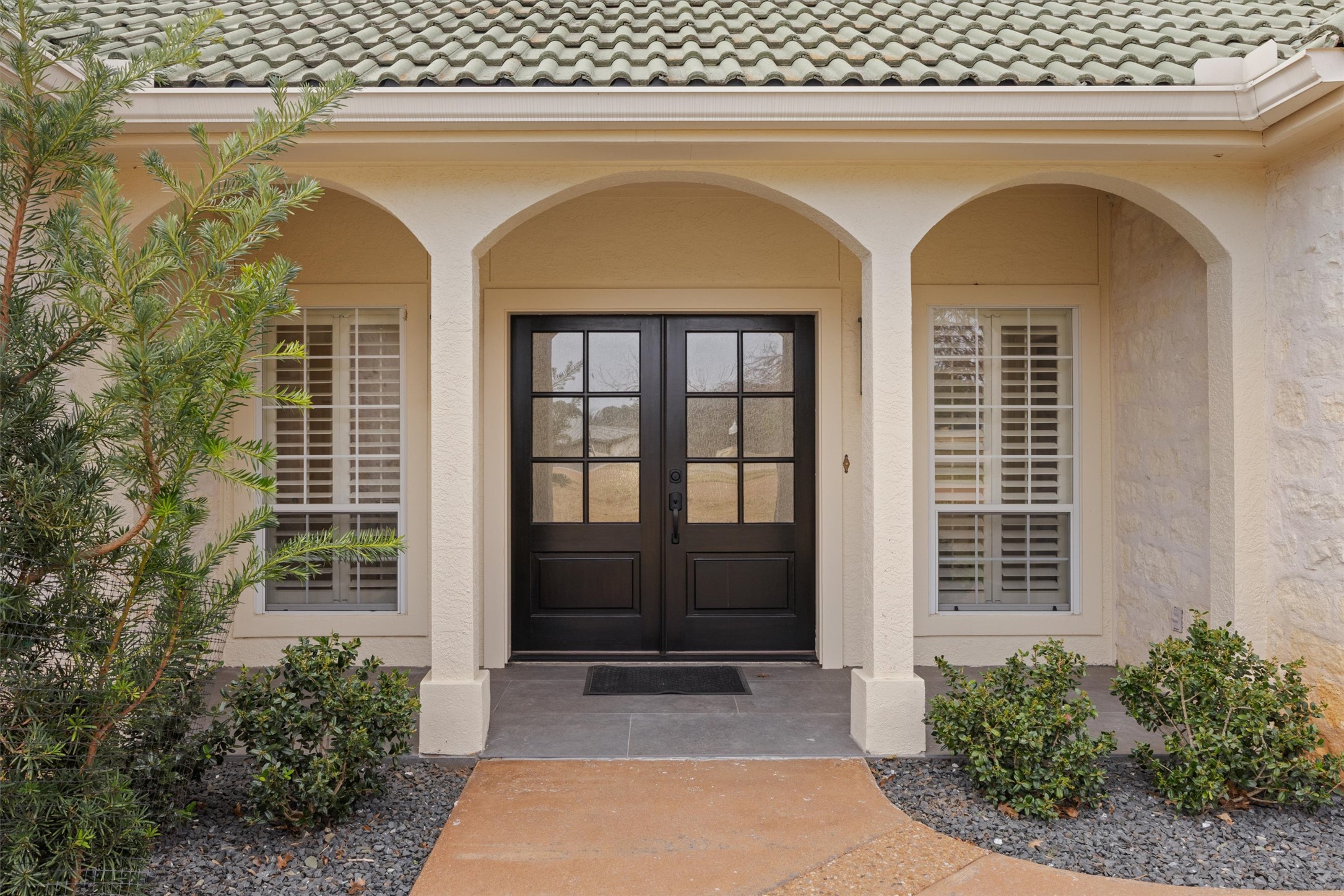700 Shadow Hill Road Horseshoe Bay, TX 78657 - Photo 3 of 23 a front view of a house with large windows