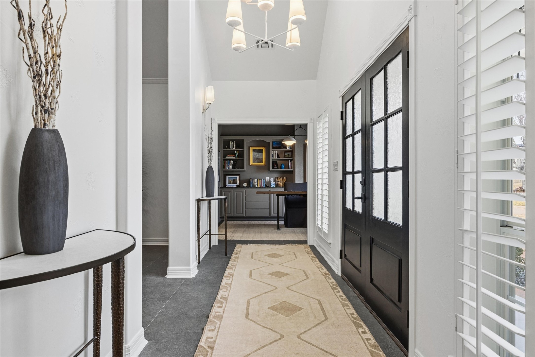 700 Shadow Hill Road Horseshoe Bay, TX 78657 - Photo 4 of 23 a view of a hallway with wooden floor and staircase