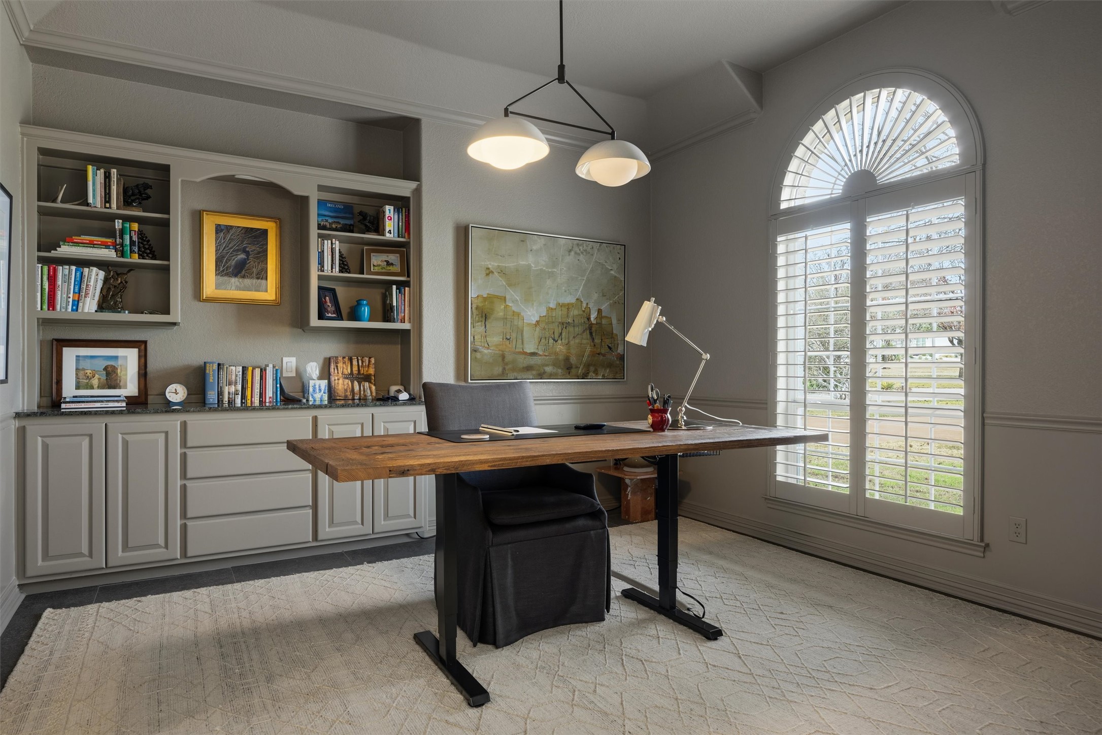 700 Shadow Hill Road Horseshoe Bay, TX 78657 - Photo 7 of 23 a view of a workspace with furniture and a window
