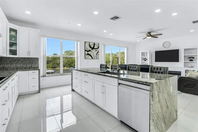 a large kitchen with cabinets
