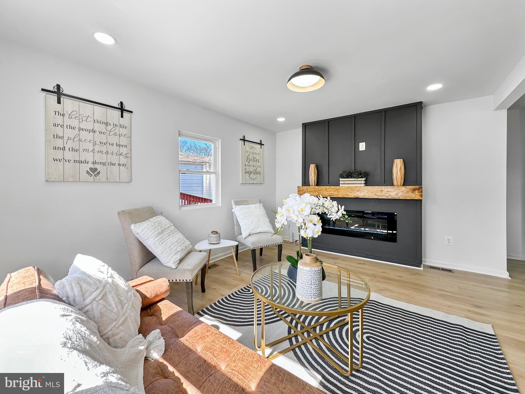 5210 Addison Road Capitol Heights, MD 20743 - Photo 12 of 55 Living Room with Electric Fireplace