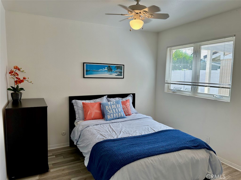 33635 Capstan Drive Dana Point, CA 92629 - Photo 17 of 33 a bedroom with a bed and wooden floor