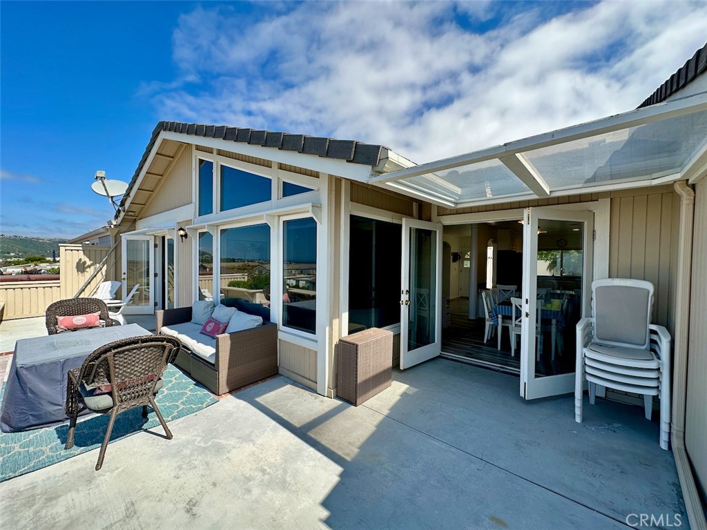 33635 Capstan Drive Dana Point, CA 92629 - Photo 23 of 33 a view of a patio with a table and chairs