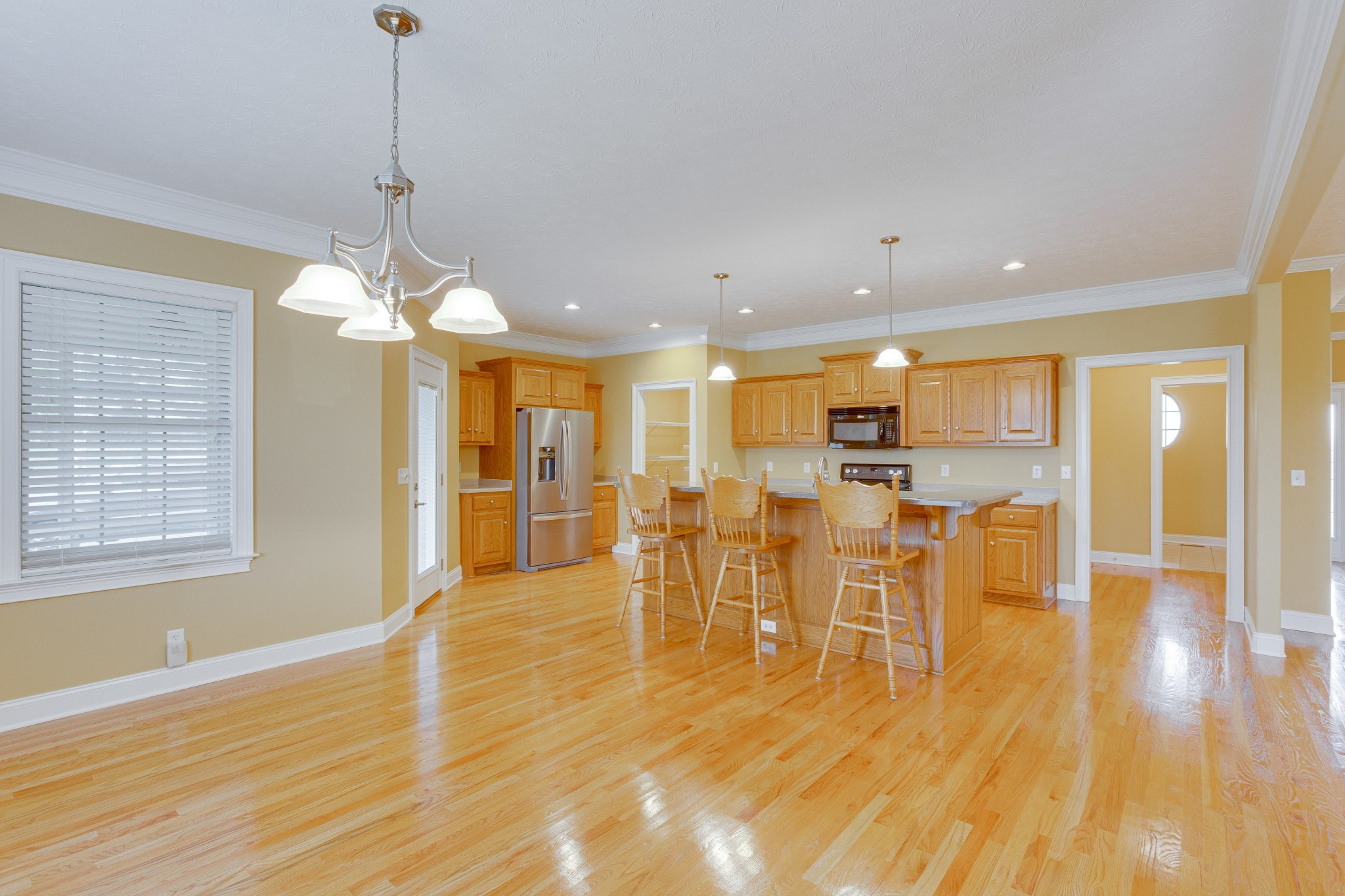1632 Lawrence Lane Springfield, TN 37172 - Photo 7 of 51 a view of a kitchen with dining table chairs and entryway