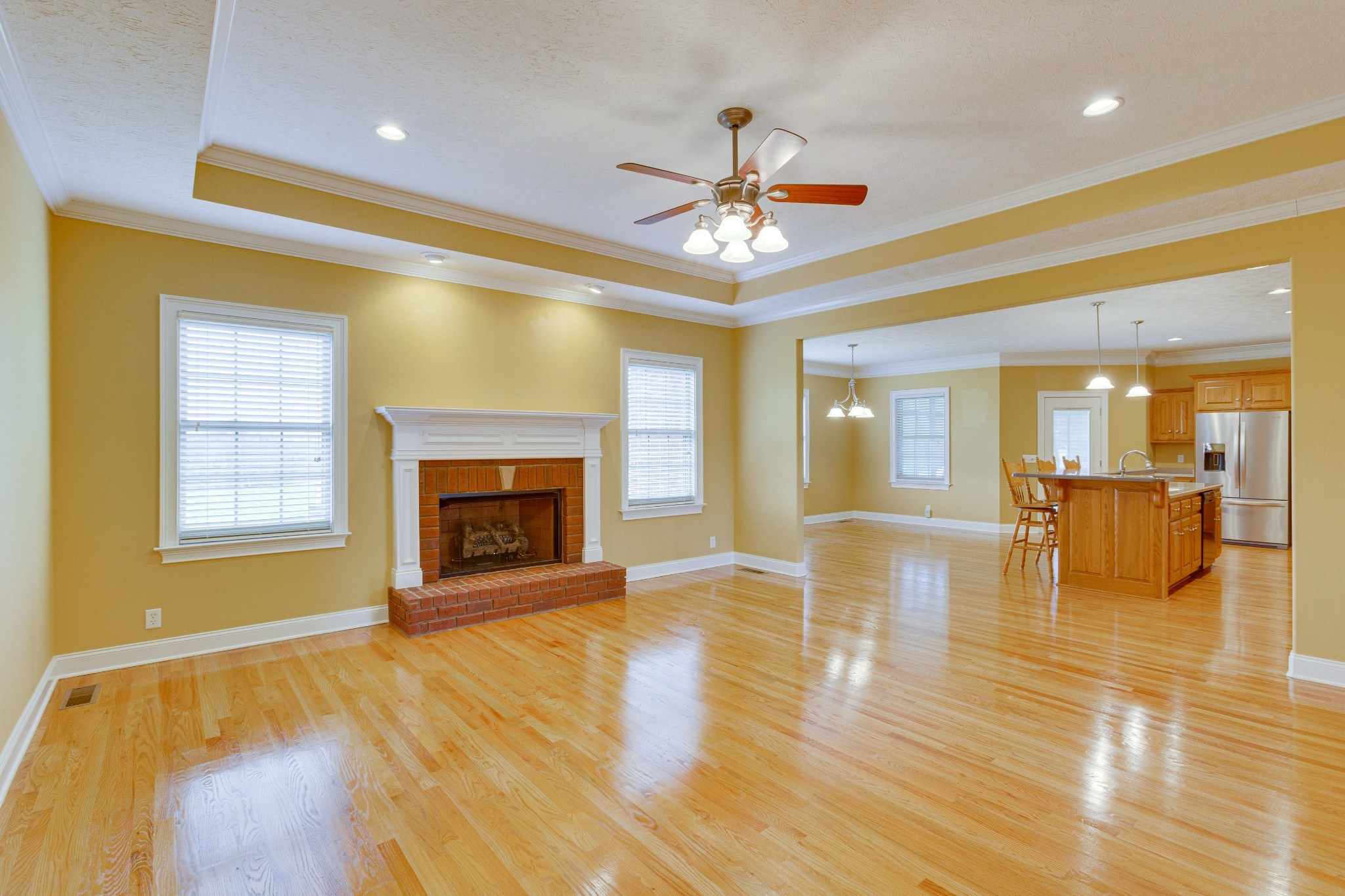 1632 Lawrence Lane Springfield, TN 37172 - Photo 10 of 51 a view of an empty room with a fireplace and a window