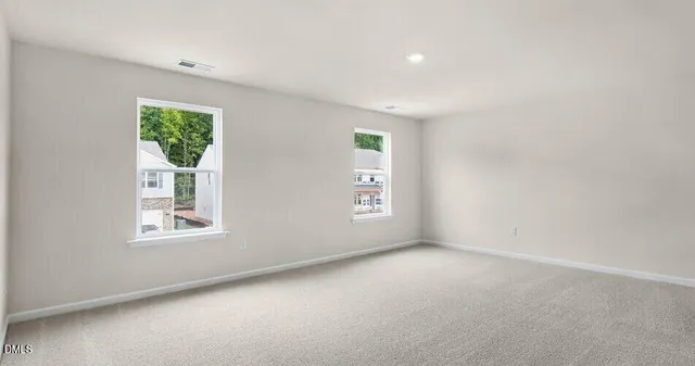 an empty room with windows