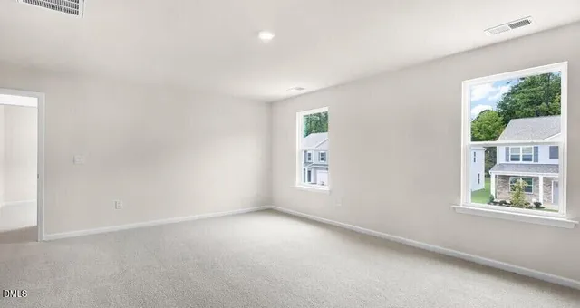 an empty room with windows
