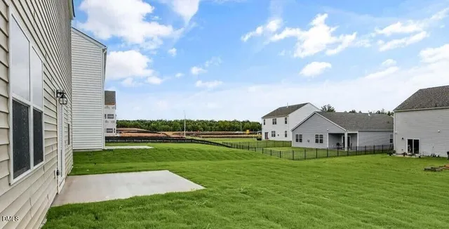 a view of a house with a big yard