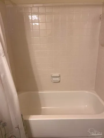 a bathroom with a bathtub