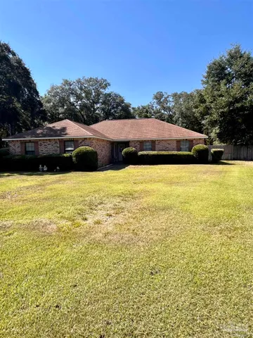 a view of a large pool with an outdoor space
