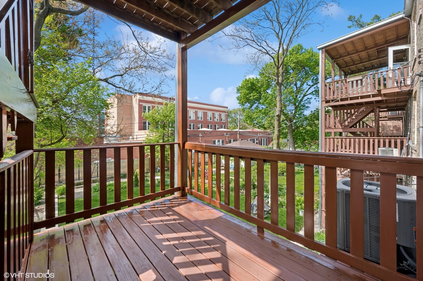 2137 West Cortez Street, Unit 2 Chicago, IL 60622 - Photo 16 of 19 a view of a balcony with wooden floor