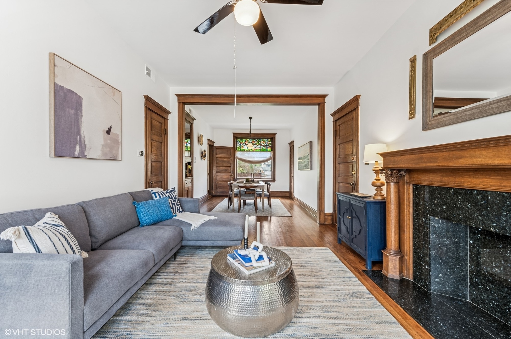 2137 West Cortez Street, Unit 2 Chicago, IL 60622 - Photo 6 of 19 a living room with furniture and a fireplace