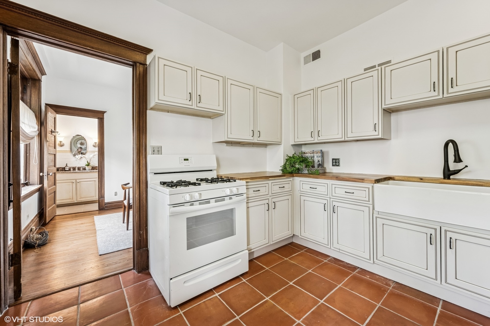 2137 West Cortez Street, Unit 2 Chicago, IL 60622 - Photo 9 of 19 a kitchen with granite countertop appliances cabinets and a sink