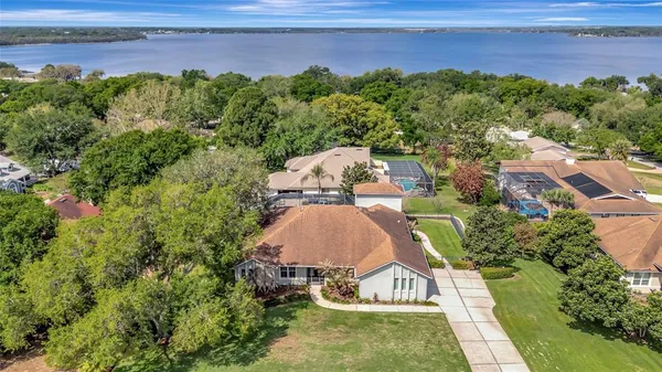 an aerial view of a house with a garden