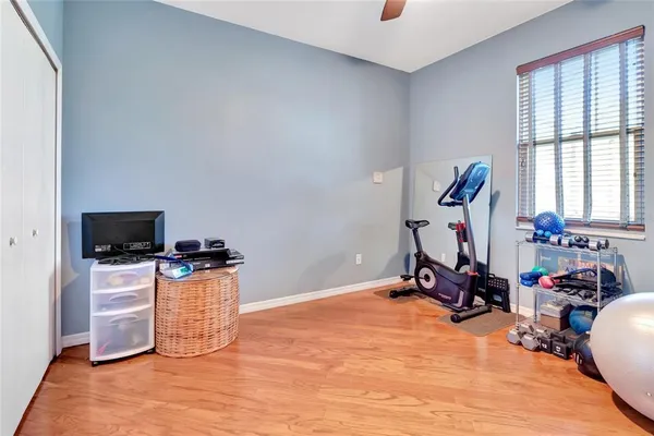a room with furniture and a flat screen tv