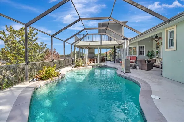 a view of a patio with a table and chairs