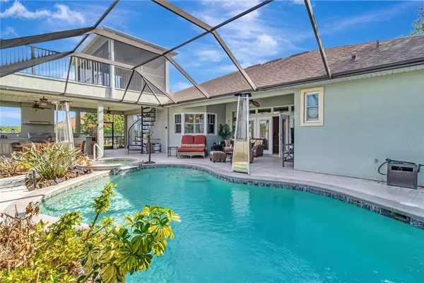 a view of a swimming pool with a patio