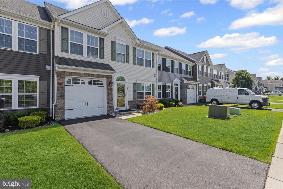54 Heals Farm Road Burlington, NJ 08016 - Photo 2 of 26 Charming townhomes with lush green lawns.