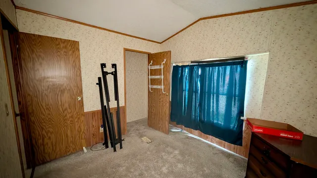 a view of a back yard of the house