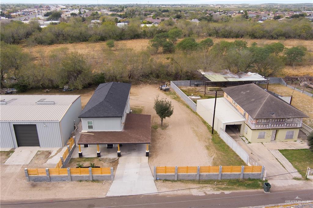 3105 Escobares Loop Roma, TX 78584 - Photo 3 of 5 a aerial view of a house with a lake view