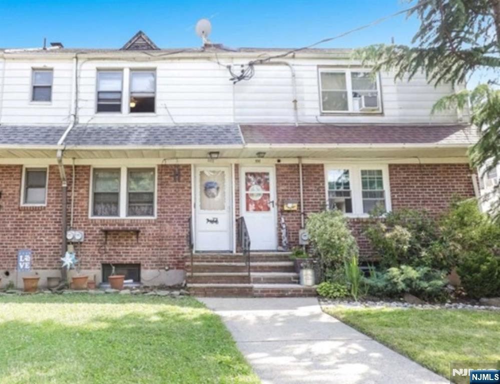 592 Beverly Road, Unit 2 Teaneck, NJ 07666 - Photo 7 of 7 a view of a house with a yard