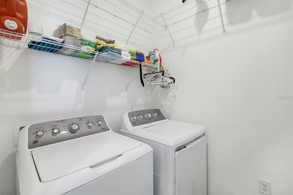 14180 Poppy Fld Loop Punta Gorda, FL 33955 - Photo 21 of 30 a utility room with dryer and washer