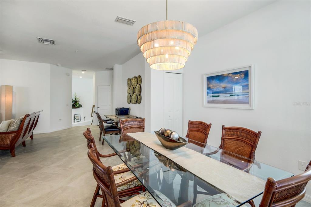 14180 Poppy Fld Loop Punta Gorda, FL 33955 - Photo 8 of 30 a workspace with furniture and chandelier
