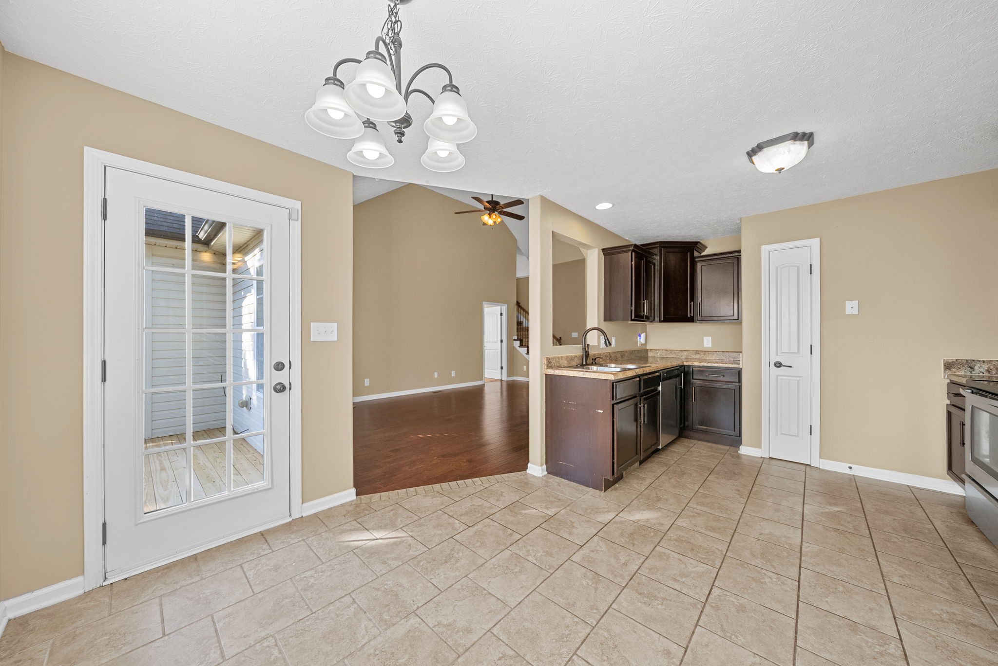 3783 Suiter Road Clarksville, TN 37040 - Photo 11 of 31 a kitchen with stainless steel appliances granite countertop a refrigerator and a sink