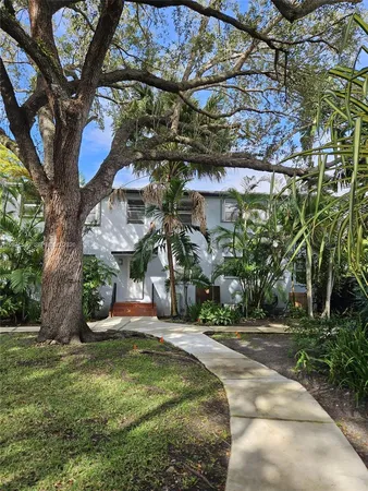 a park bench sitting in the middle of a park