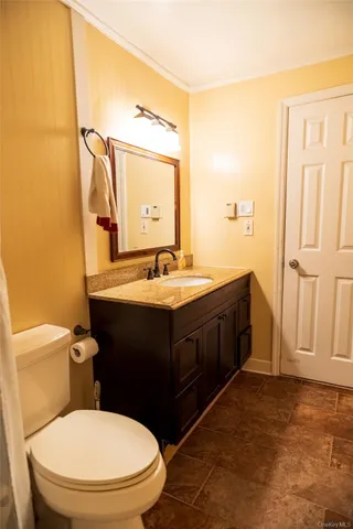 a bedroom with a bed and a closet