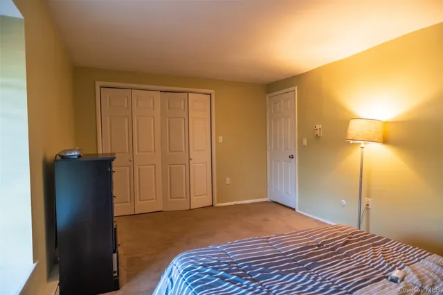 a view of a backyard with wooden fence