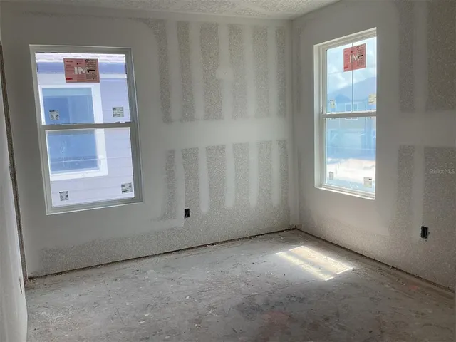 a view of an empty room with window