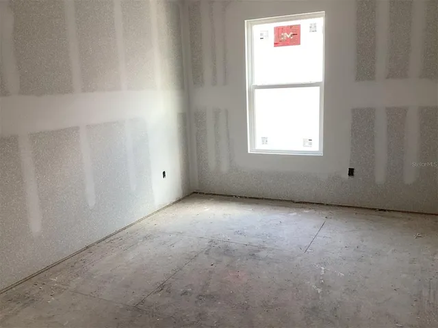 an empty room with a window