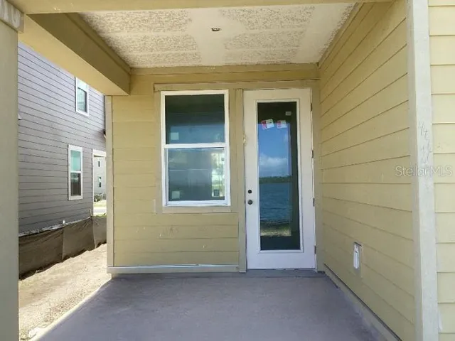 a view of kitchen and wooden floor