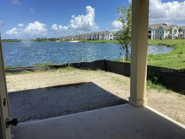 an aerial view of a house having yard