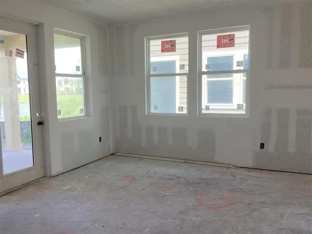 a living room with windows