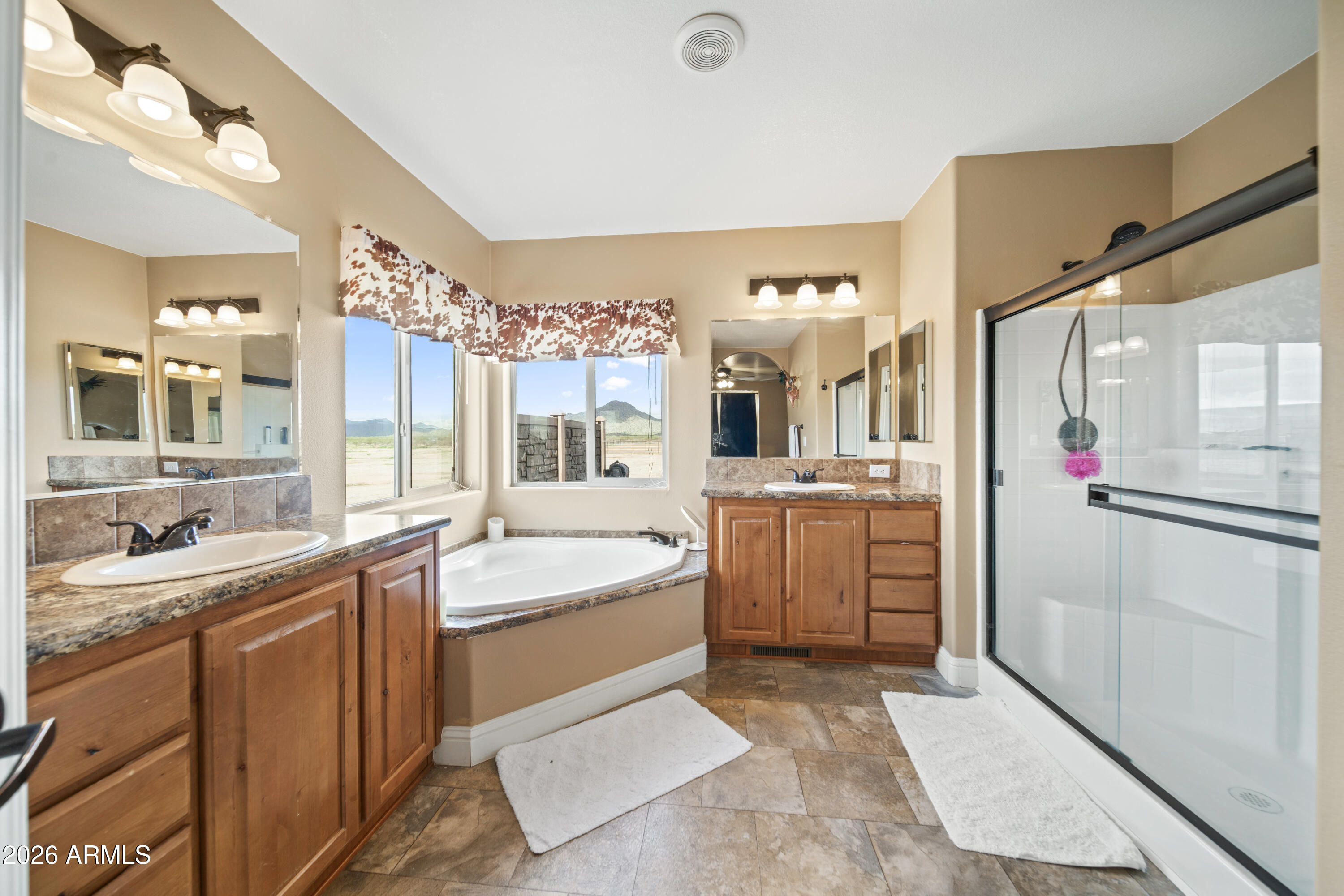46109 West J-1 Ranch Road Wickenburg, AZ 85390 - Photo 20 of 32 a large kitchen with a sink and cabinets