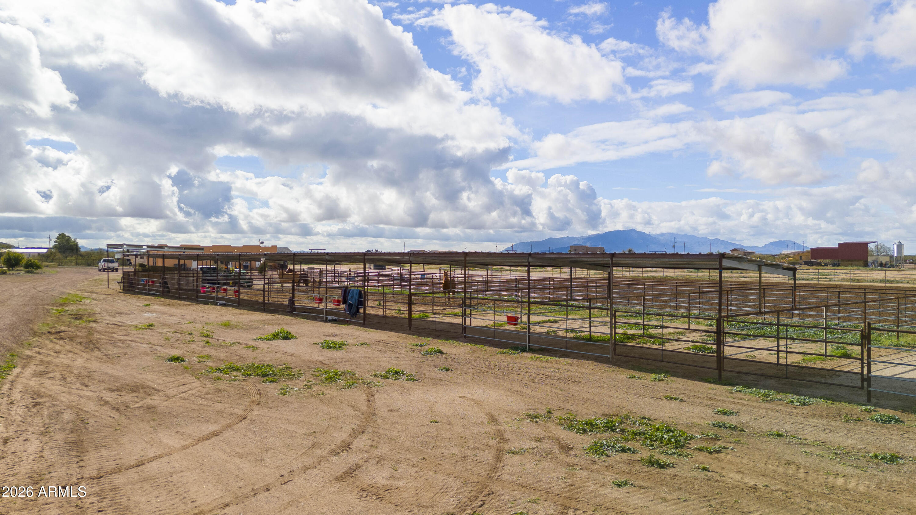 46109 West J-1 Ranch Road Wickenburg, AZ 85390 - Photo 29 of 32 a view of ocean with a building in the background