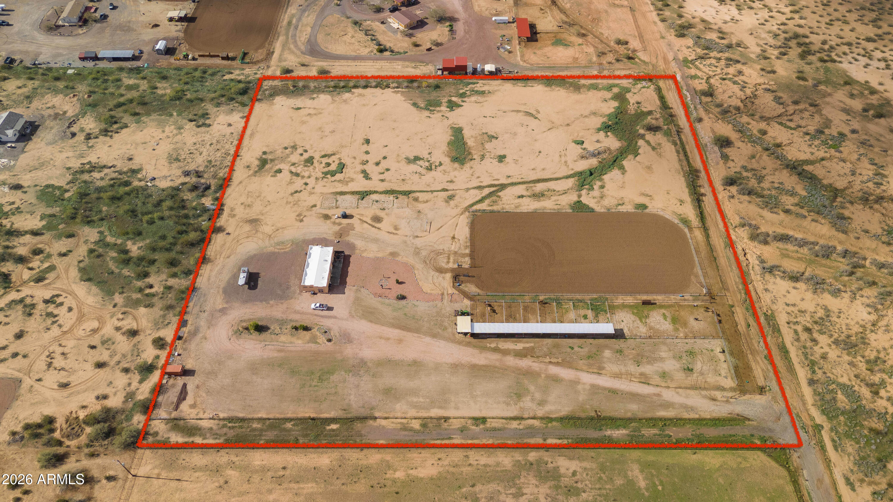 46109 West J-1 Ranch Road Wickenburg, AZ 85390 - Photo 7 of 32 an aerial view of residential houses with outdoor space