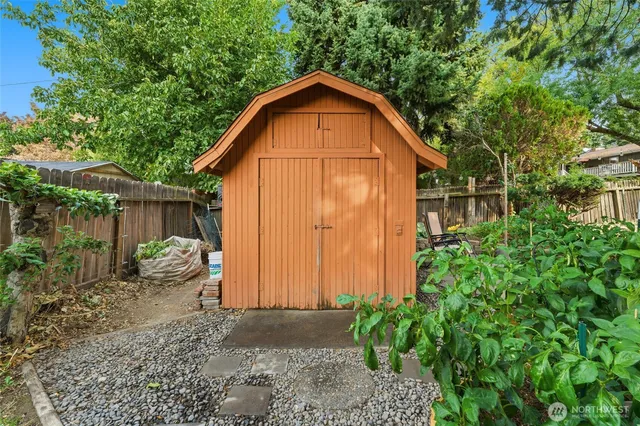 a view of a park with large trees