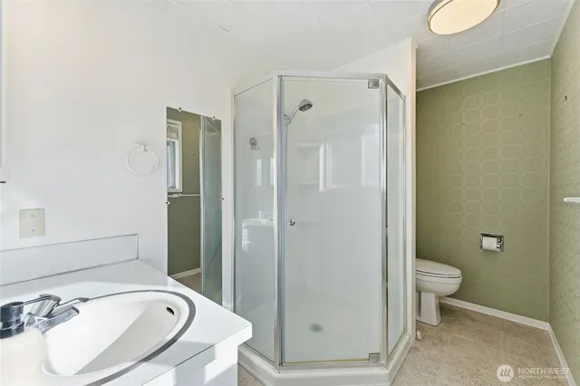 a bedroom with furniture and windows