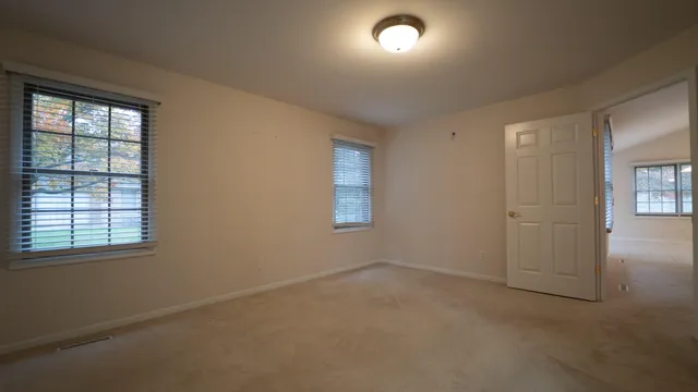 an empty room with windows